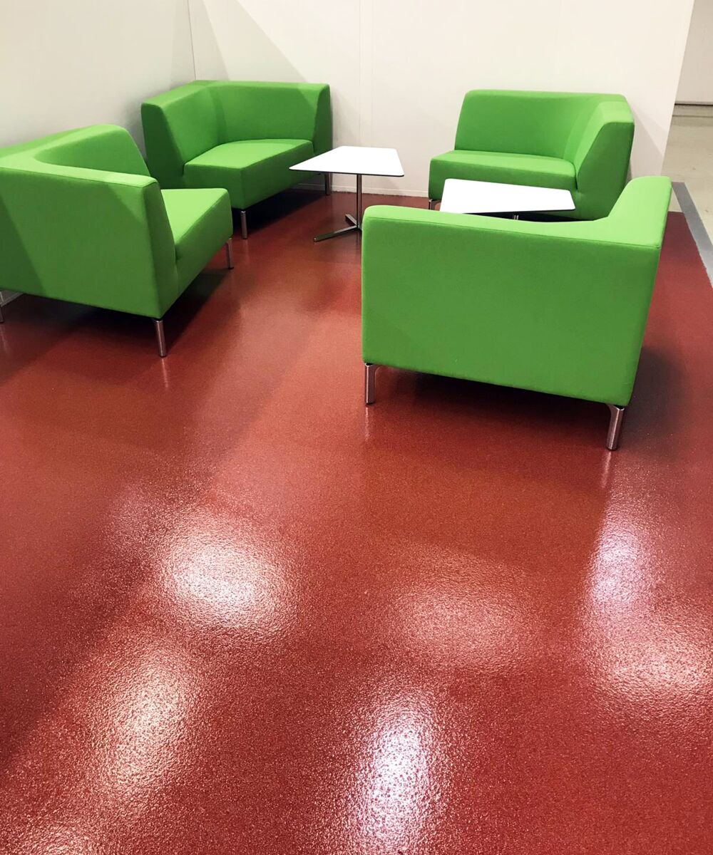 Red industrial floor coating with highly durable seal coat