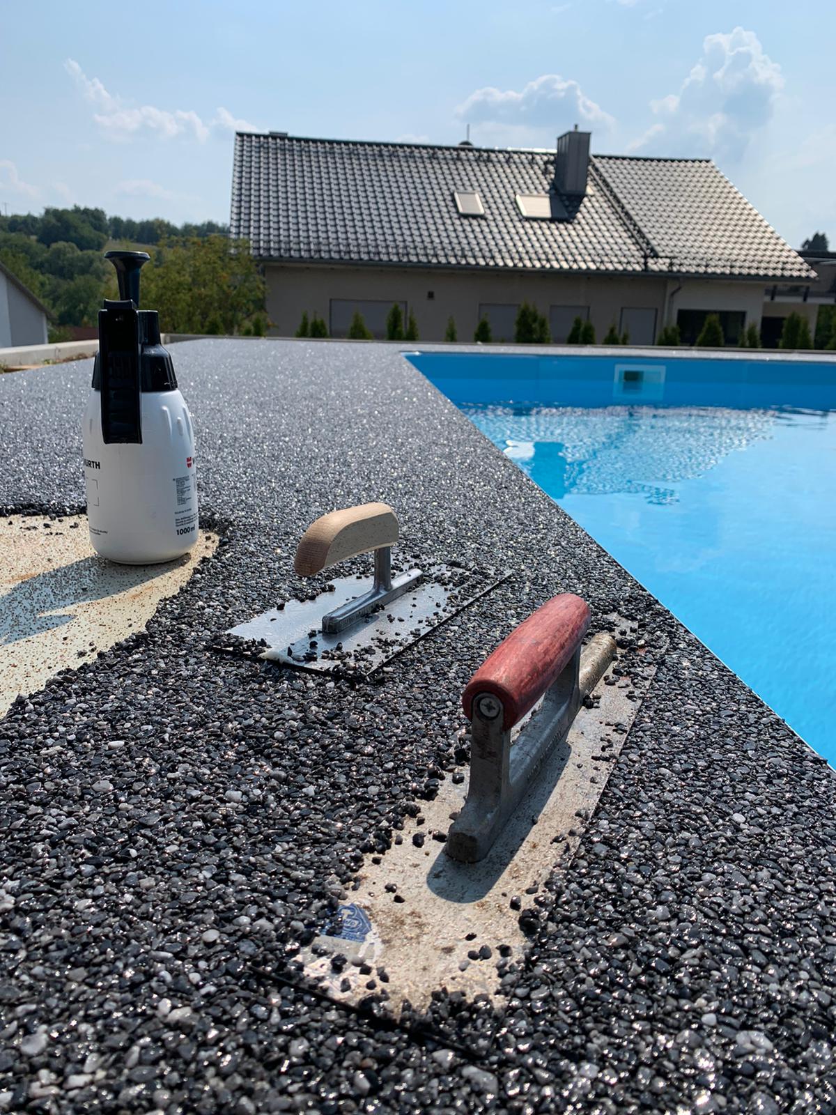 Stone carpet on terrace with pool Viacor